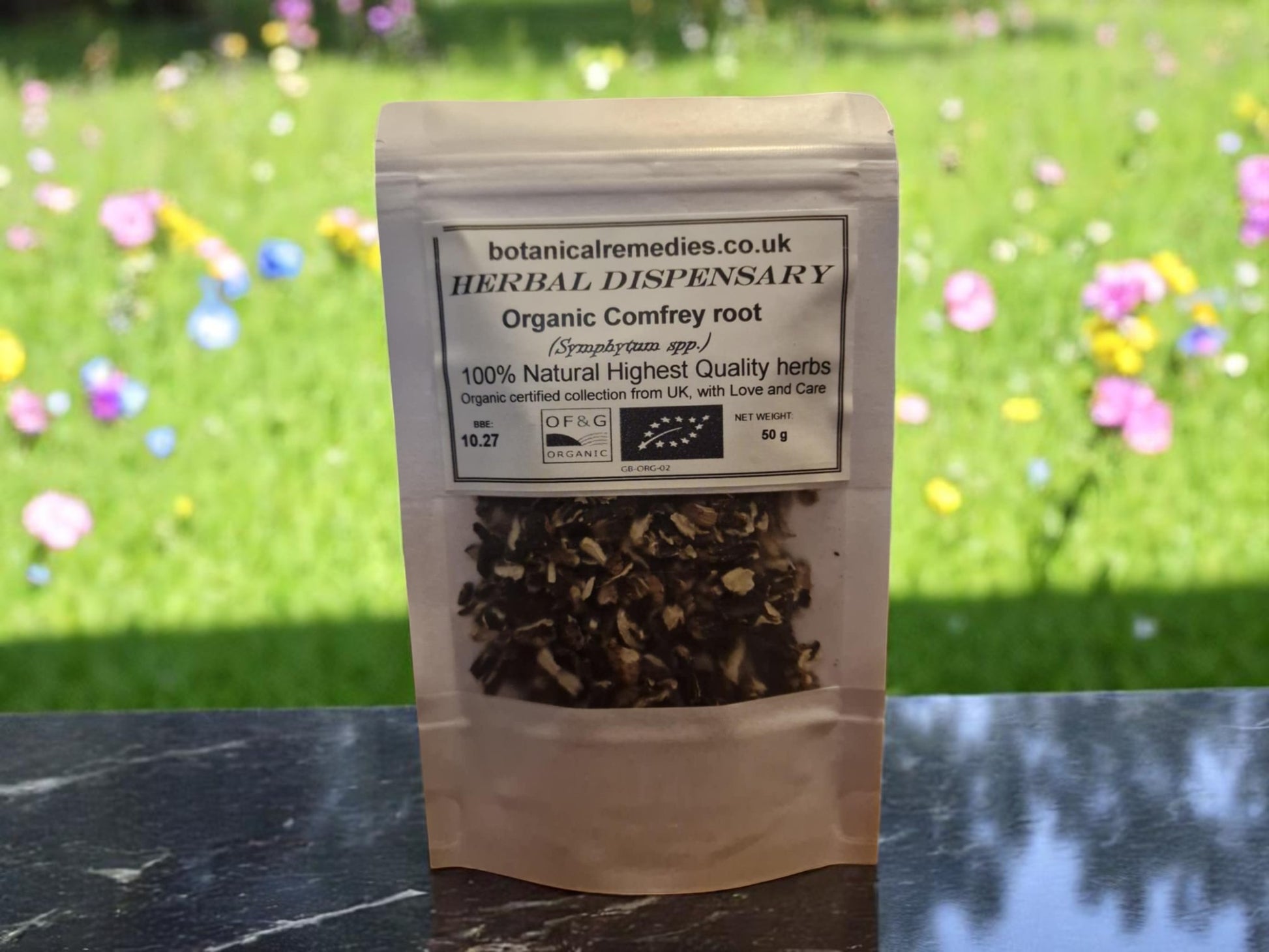 Package with Comfrey root organic from Botanical Remedies herbal dispensary, dried and cut, an herbal remedy