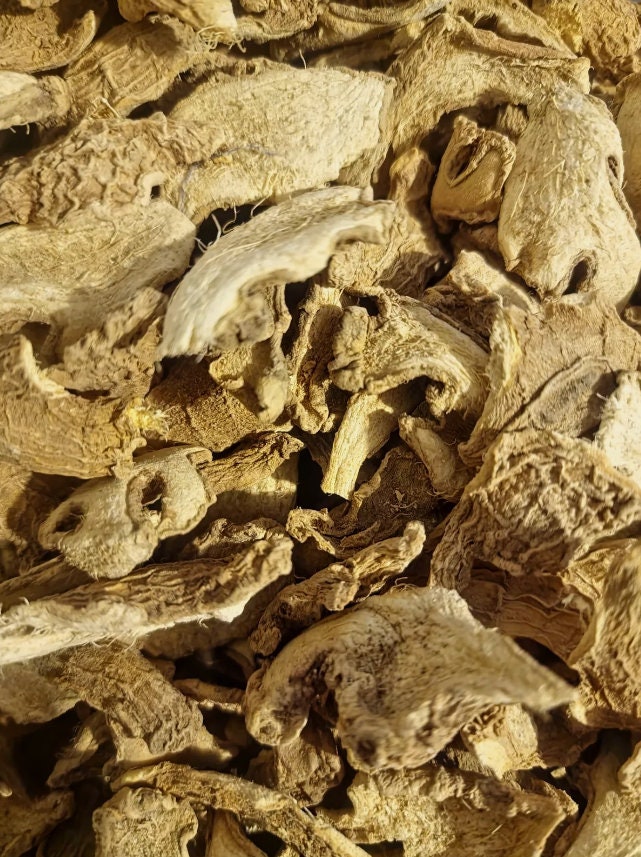 close up of dried and cut Ginger root slices, an herbal remedy from Botanical Remedies herbal dispensary, loose herbal tea
