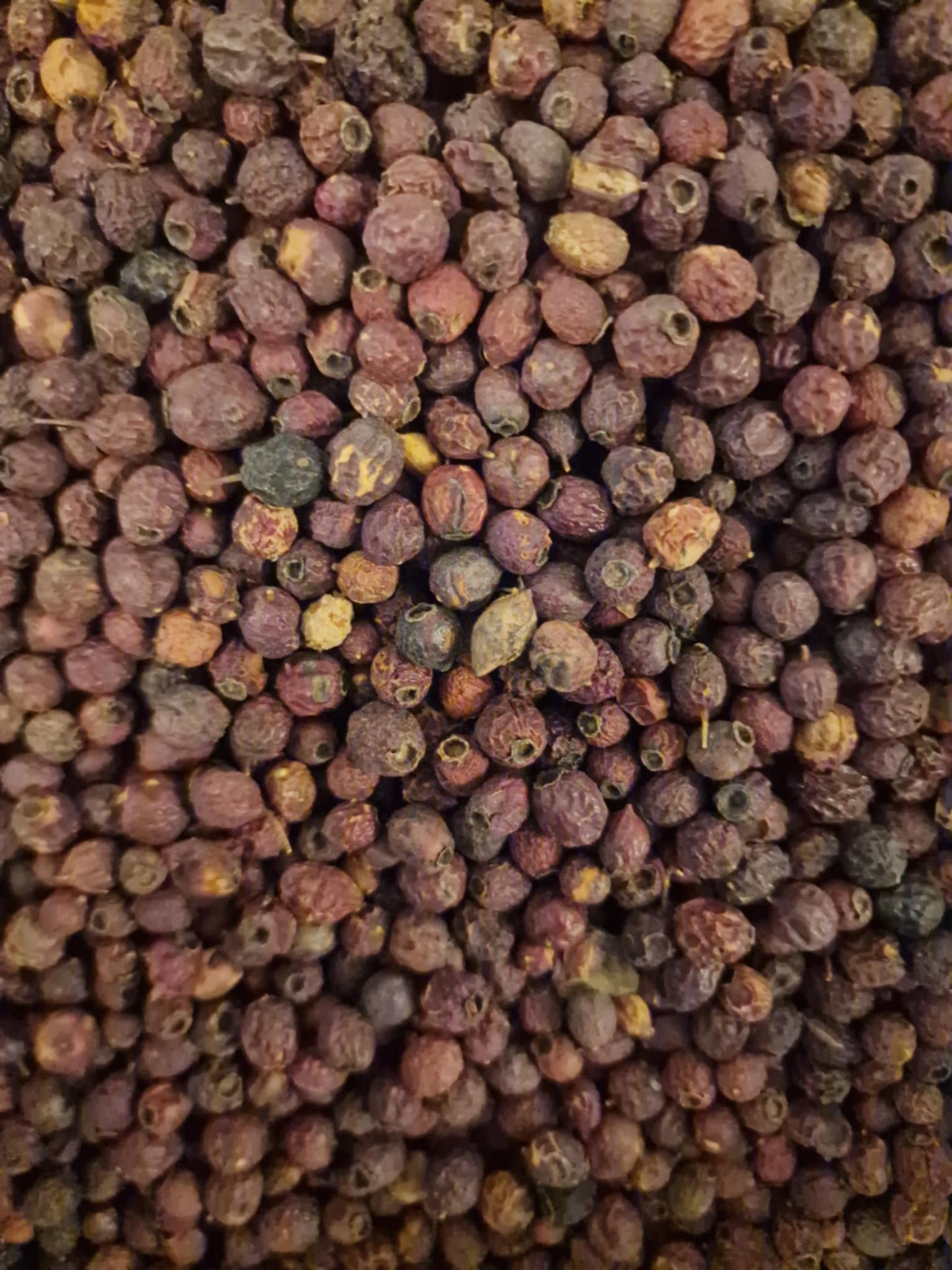 Close-up of dried Organic hawthorn berries, loose herbal tea, an herbal remedy