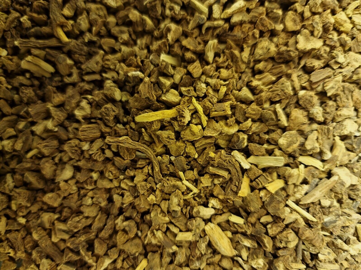 close up of dried and cut Indian saraparilla - Anantmool root, an herbal remedy, loose herbal tea