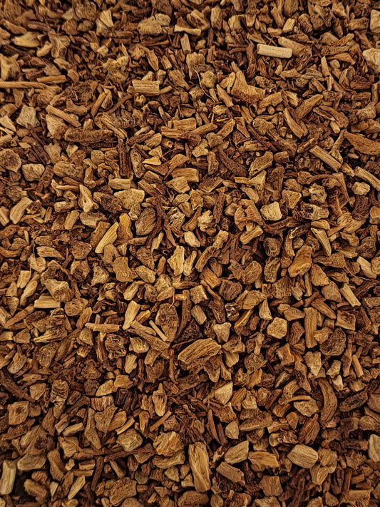 Close-up of dried and cut Organic Angelica root, an herbal remedy from Botanical Remedies herbal dispensary, loose herbal tea