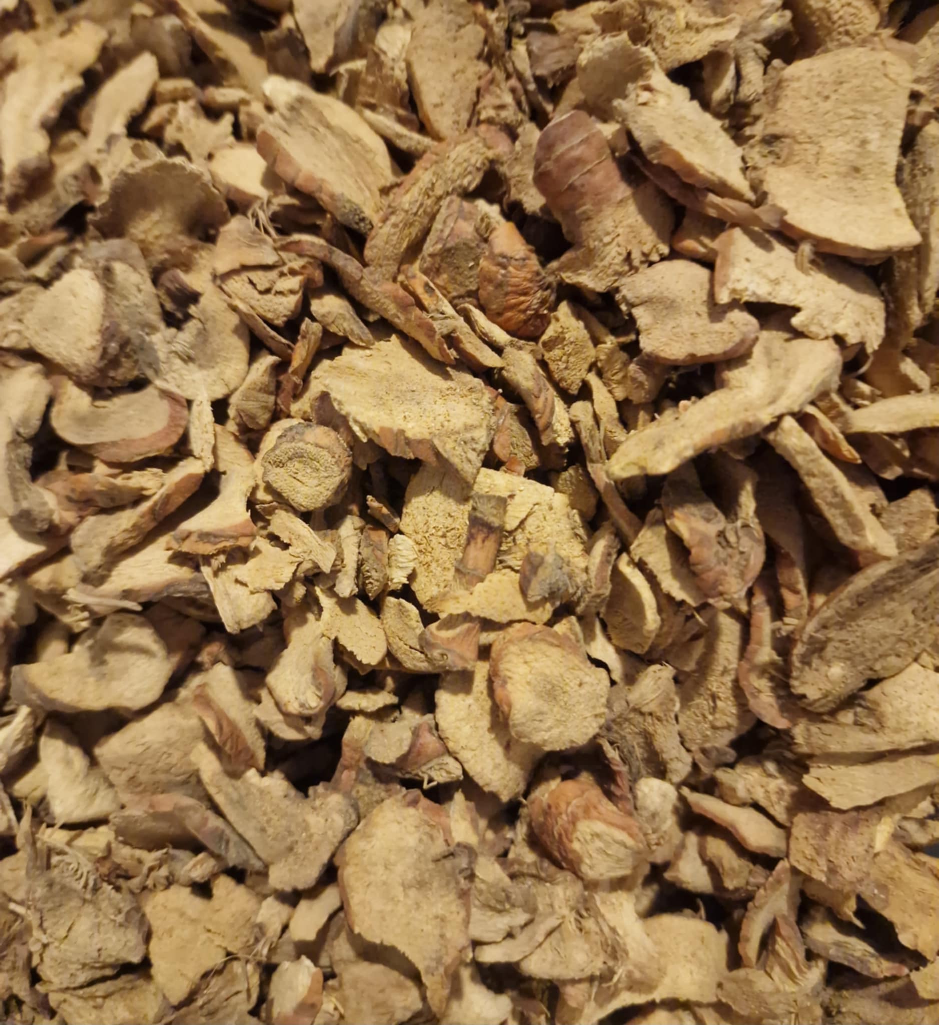 Close up of Galangal root organic, dried and cut pieces, an herbal remedy
