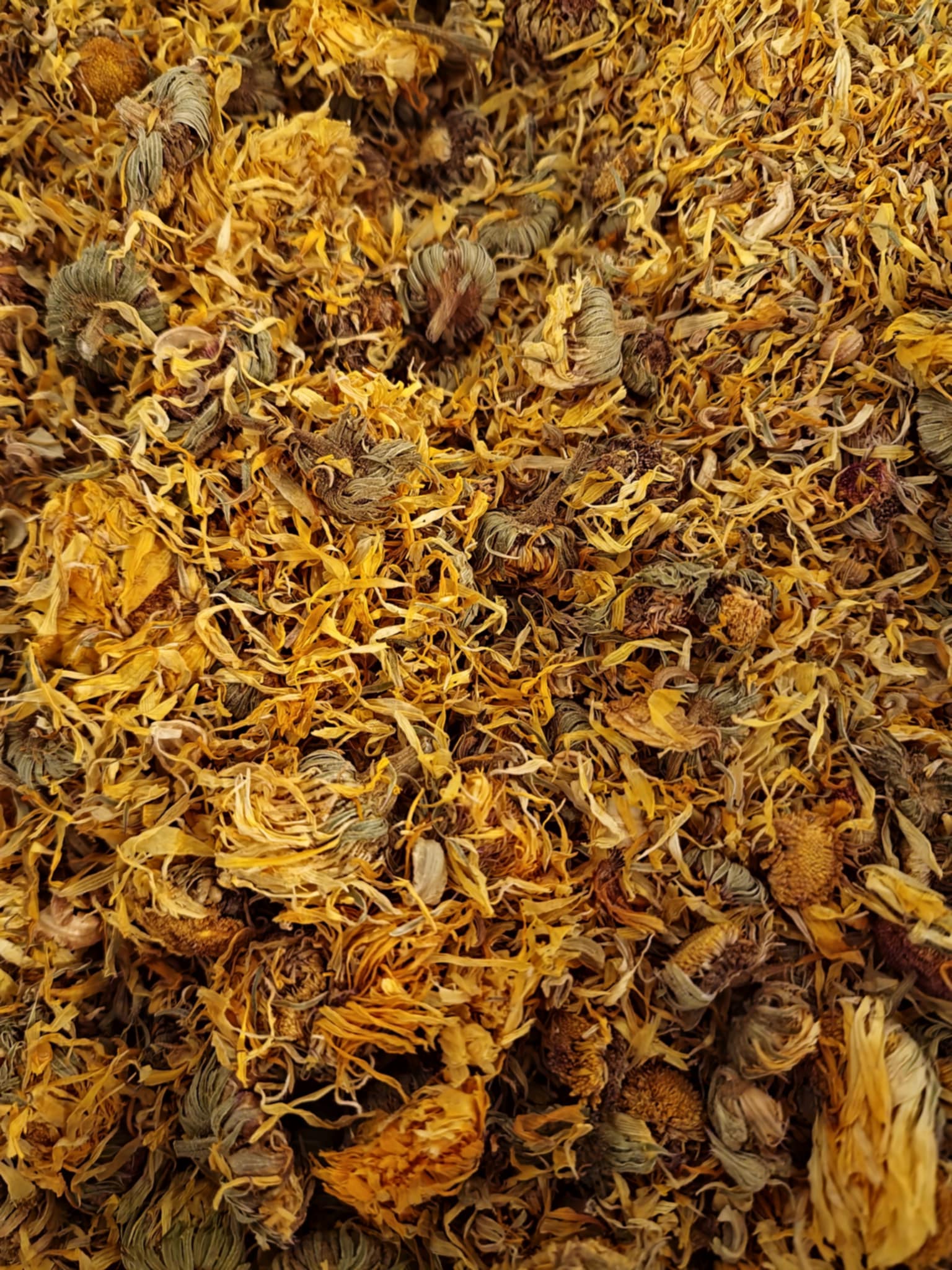 Close-up of dried Organic marigold flowers, loose herbal tea, an herbal remedy