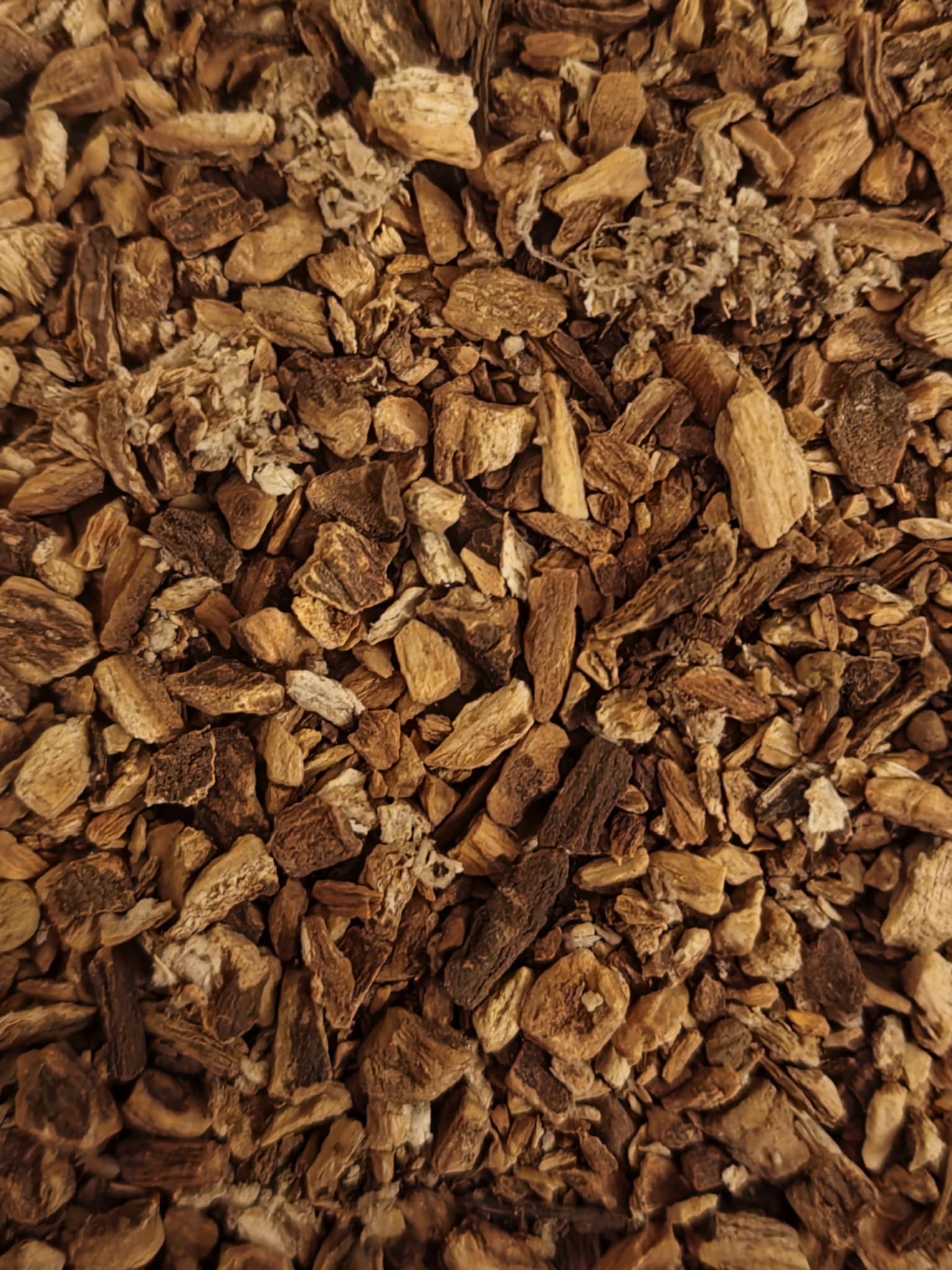 Close-up of dried and cut Organic Burdock root from Botanical remedies herbal dispensary, an herbal remedy