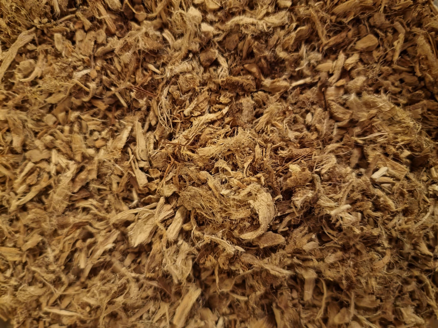 Close-up of dried and cut Organic marshmallow root from Botanical remedies, loose herbal tea, an herbal remedy