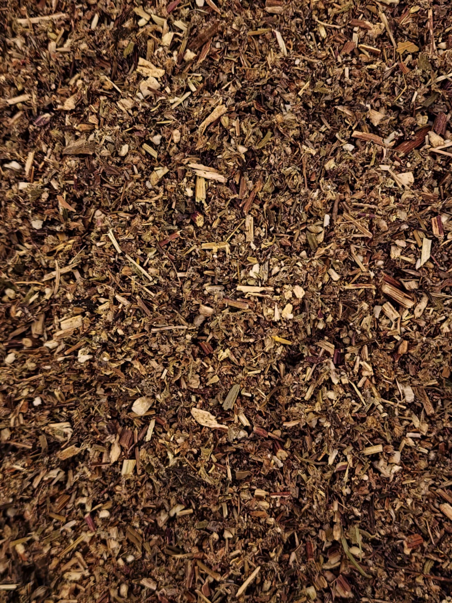 Close-up of dried and cut Organic Mugwort herb, an herbal remedy, loose herbal tea