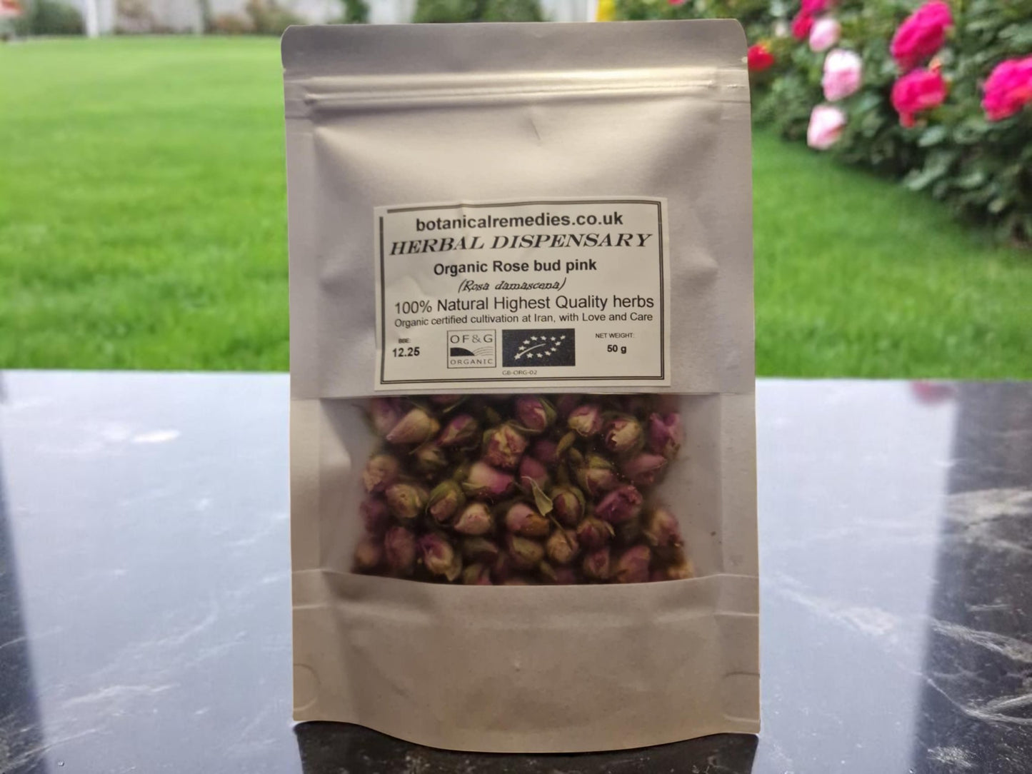 Package with Organic pink Rose buds, dried loose tea, an herbal remedy