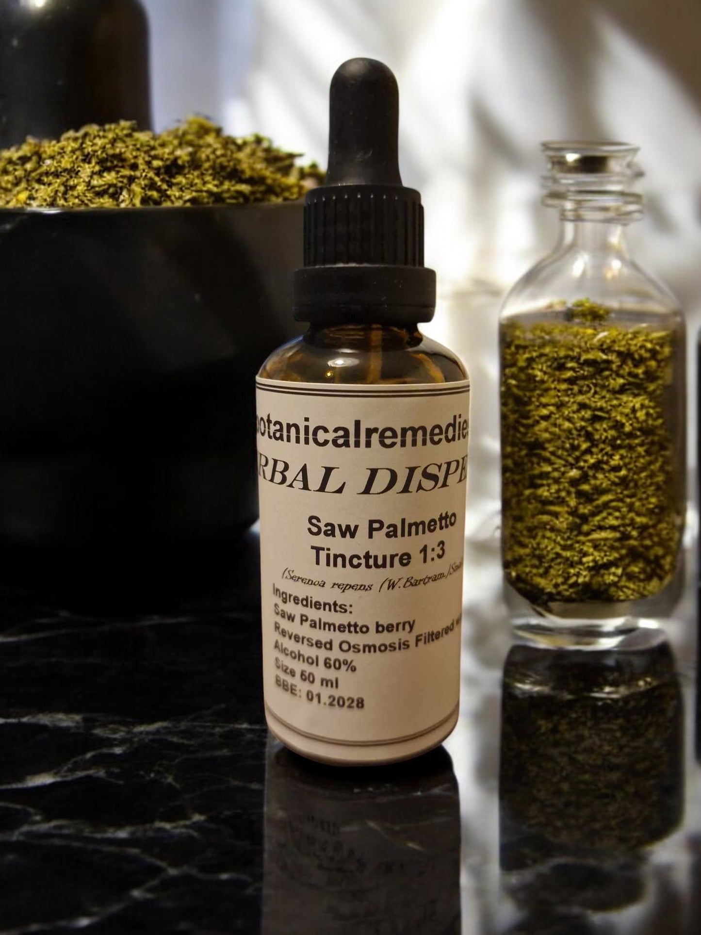 A dropper bottle of Saw Palmetto Tincture, an herbal remedy from Botanical remedies herbal dispensary