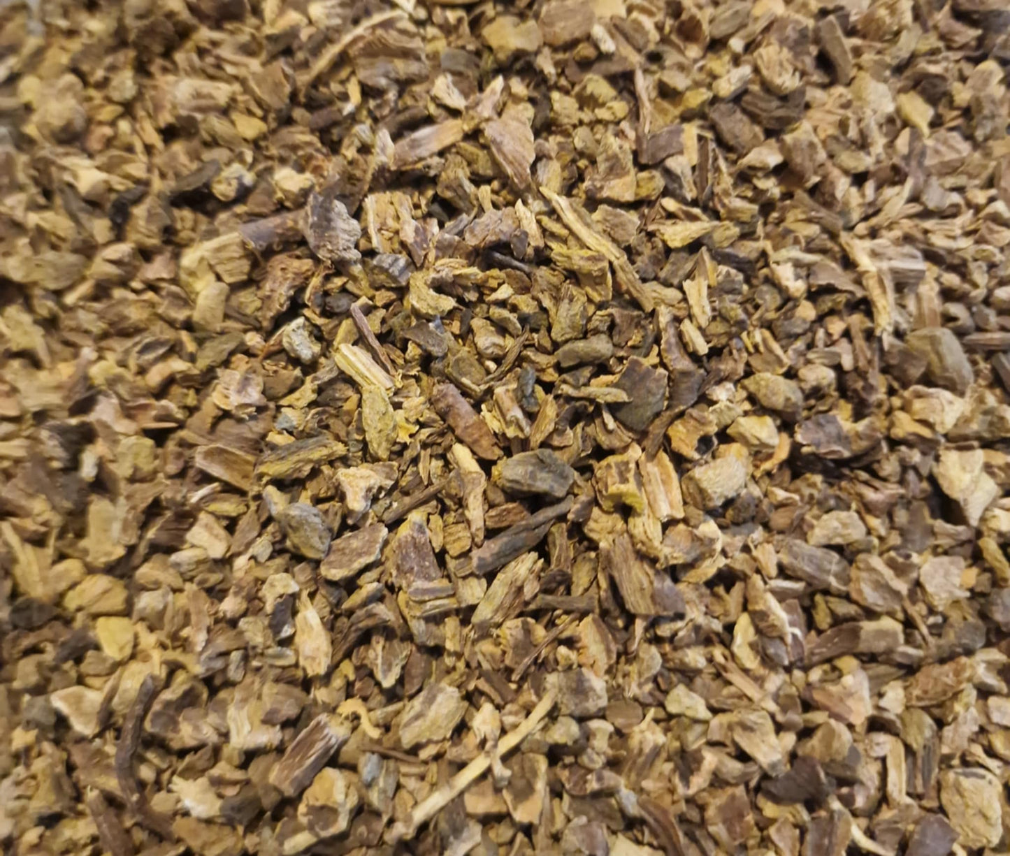 close up of Organic yellow dock root from Botanical Remedies herbal dispensary, dried and cut pieces, an herbal remedy, loose herbal tea