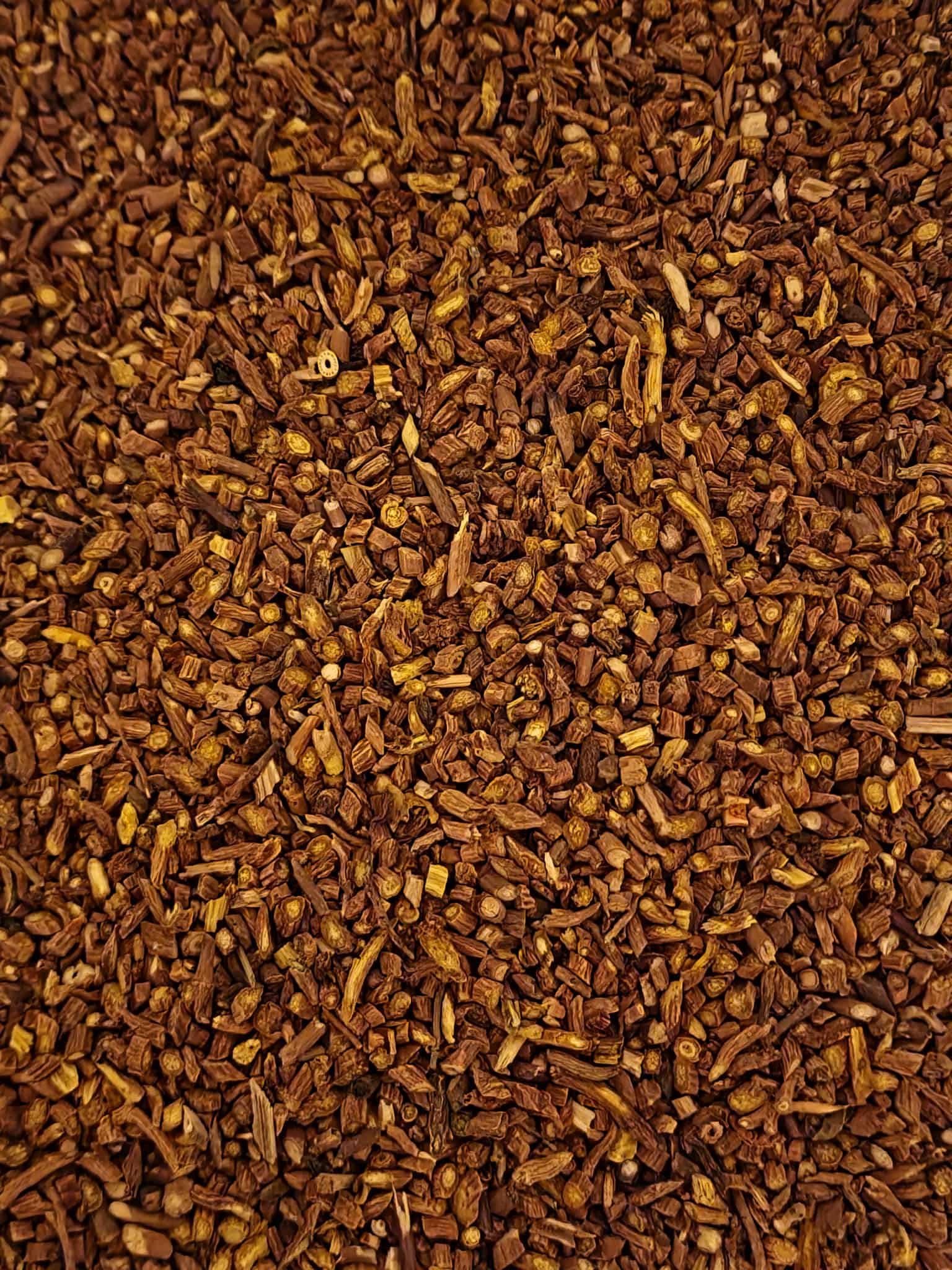 Close-up of a pile of Baikal Skullcap root dried and cut pieces from Botanical Remedies herbal dispensary, an herbal remedy, loose herbal tea