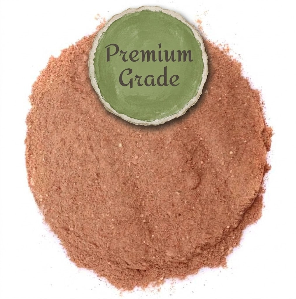 Close up of finely milled Premium Amla fruit powder featuring an earthy green Premium Grade badge. A high-quality daily Ayurvedic supplement and antioxidant tonic.