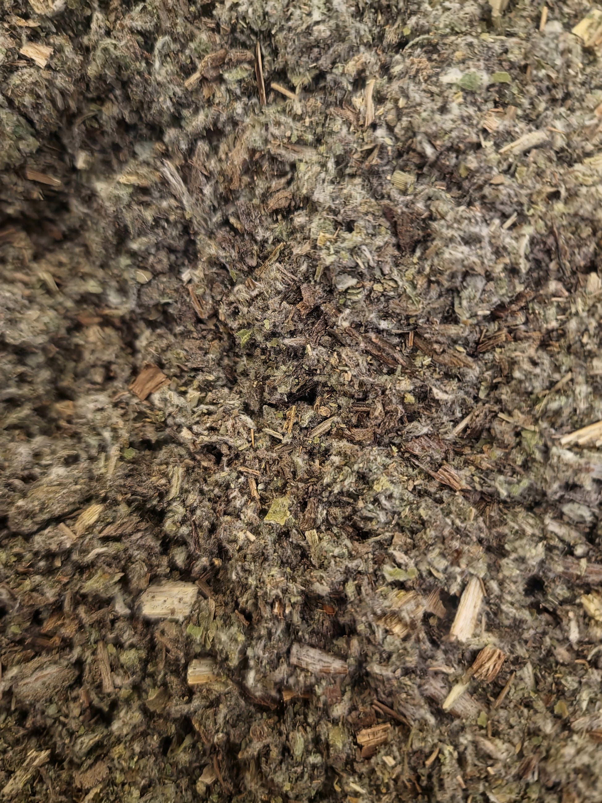 close up of dried and cut Artichoke herb, an loose herbal tea from Botanical Remedies herbal dispensary