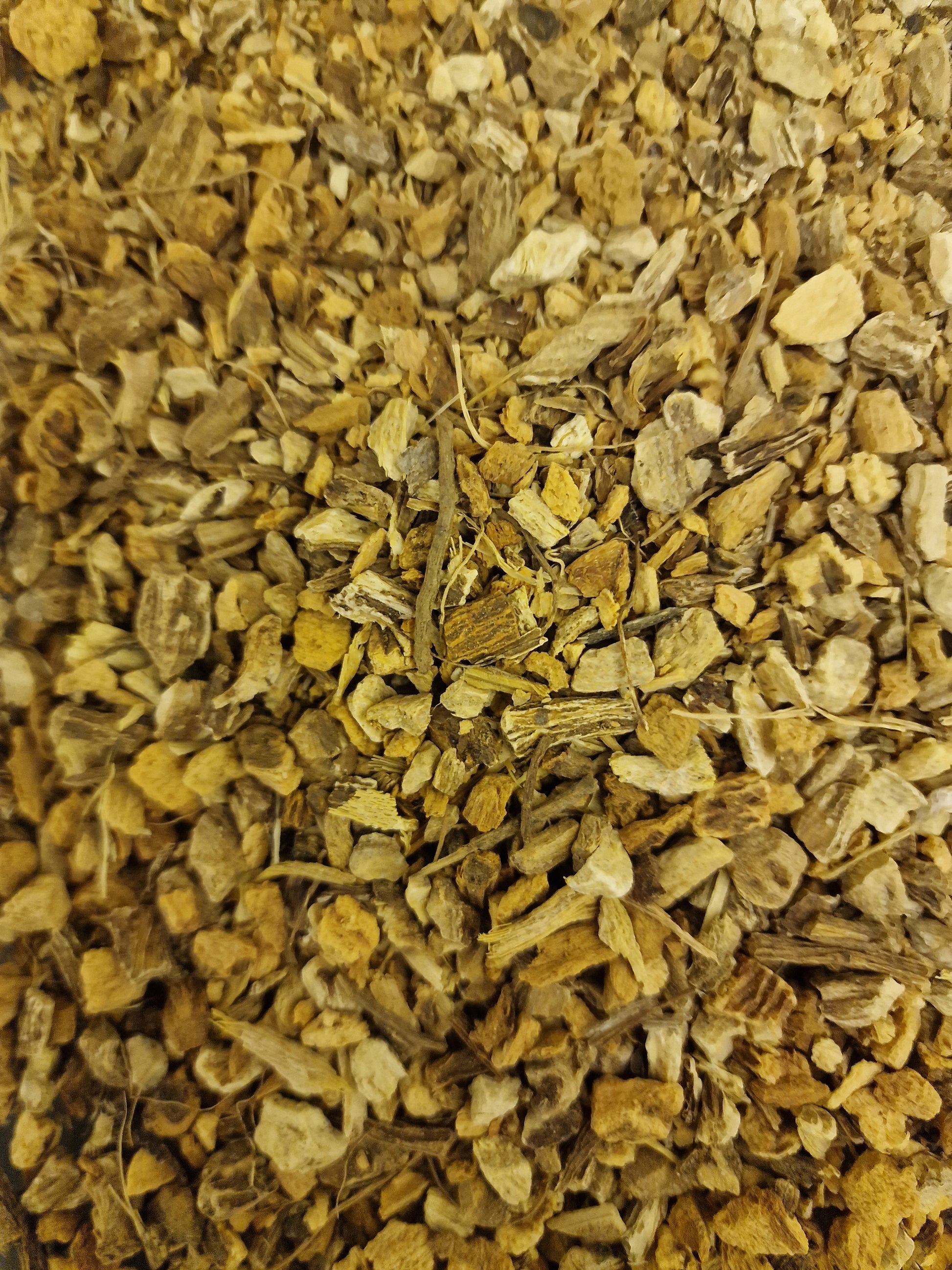 close up of dried and cut carline thistle root, an herbal remedy from Botanical Remedies herbal dispensary, loose herbal tea