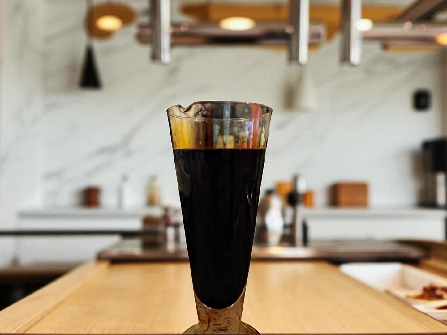 Glass of Chaga tincture from Botanical remedies herbal dispensary, an herbal remedy