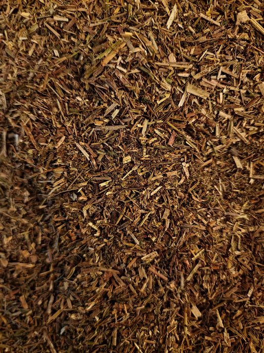 Close up of dried and cut Cleavers herb, loose herbal tea from Botanical Remedies herbal dispensary, an cleansing herbal remedy 