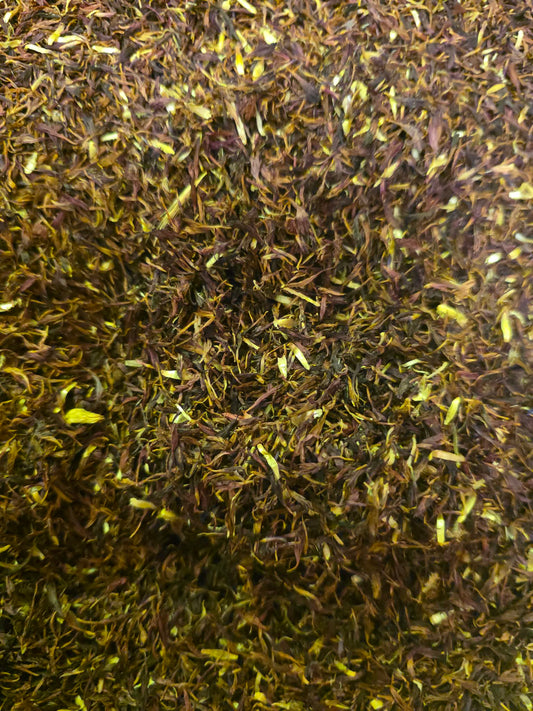 Close-up of dried Cornflower Black petals, an herbal remedy, natural confetti, or cosmetic ingredient from Botanical Remedies herbal dispensary