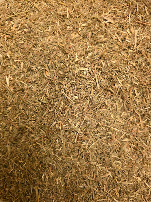 Close-up dried and cut Couch grass root, an herbal loose tea supporting urinary wellbeing