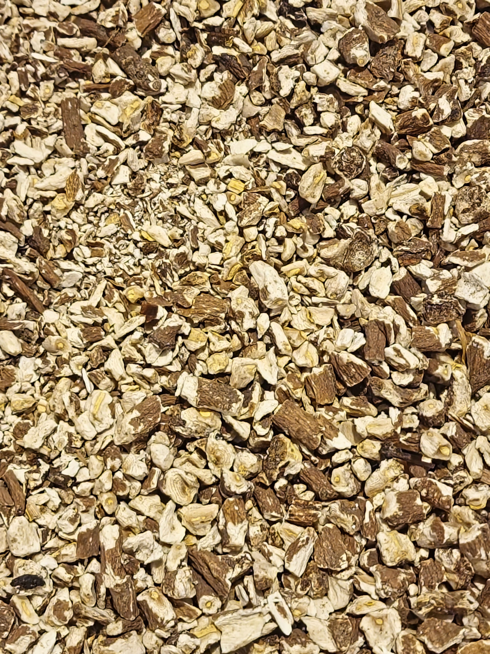 close up of Dandelion root cut pieces, an herbal remedy from Botanical Remedies herbal dispensary, loose herbal tea