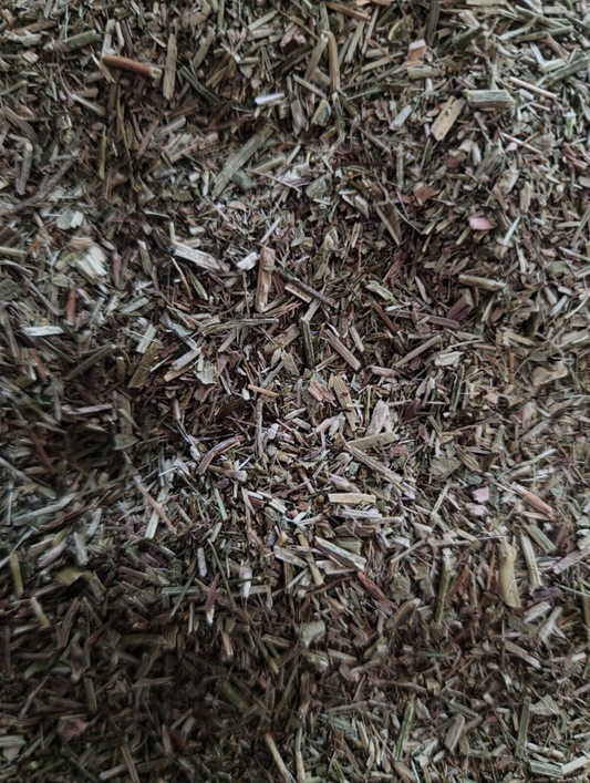 close up of dried and cut Eyebright herb, an loose herbal tea