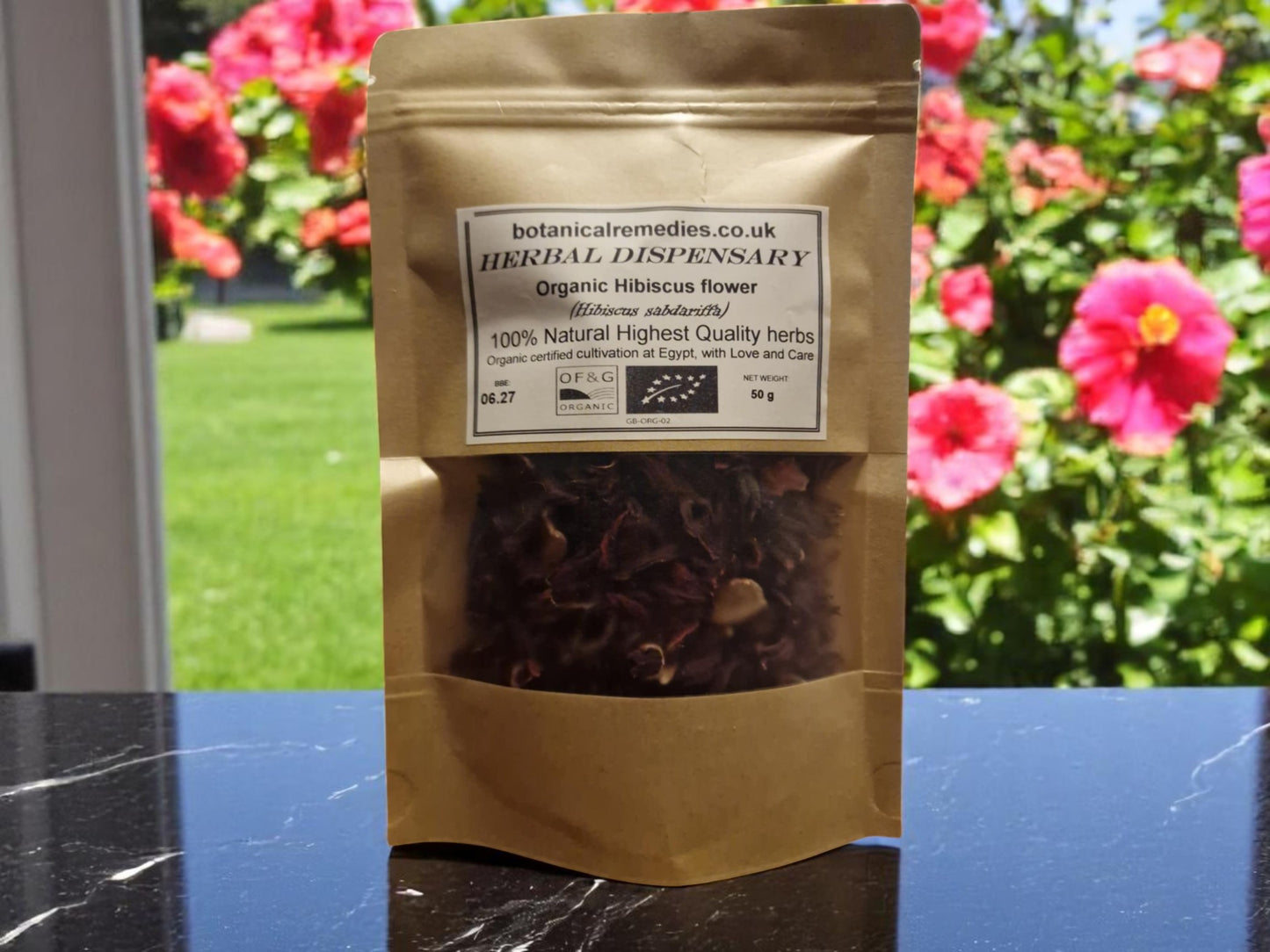 Package with Hibiscus flowers organic, dried loose tea, an herbal remedy