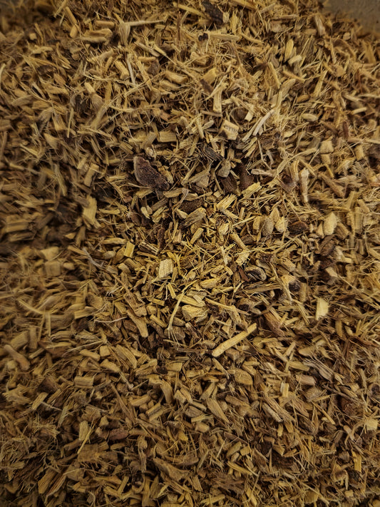 close up of dried and cut Liquorice root, loose herbal tea