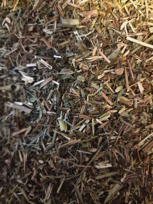 close up of meadowsweet herb, dried and cut, loose herbal tea, an herbal remedy