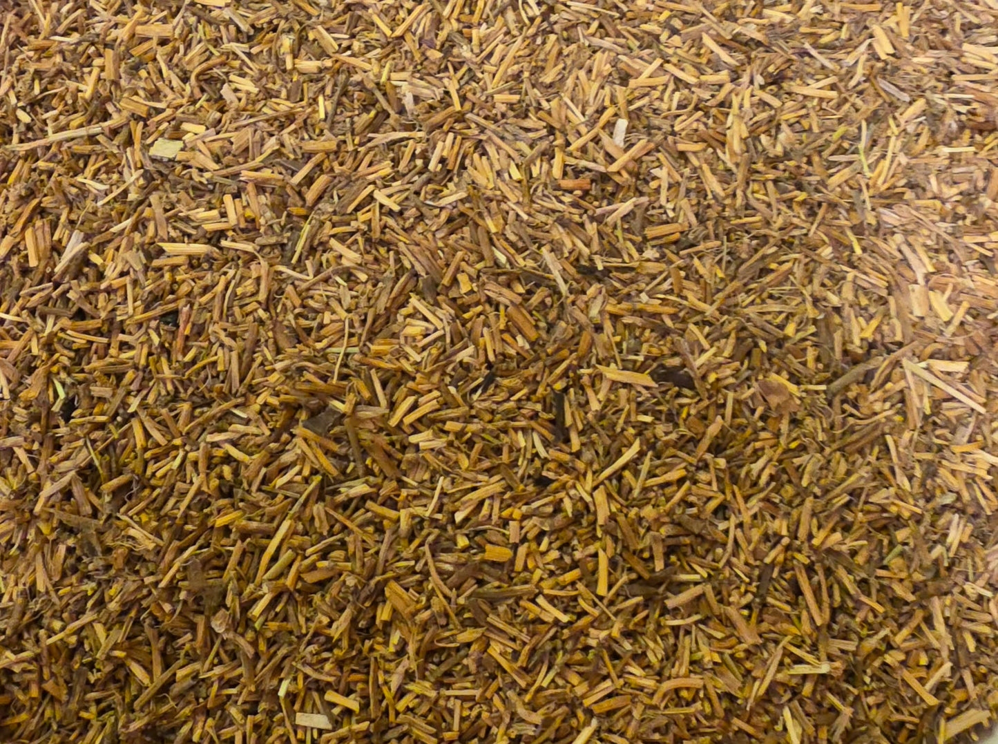 close up or dried and cut Organic Couch Grass rhizome, an herbal remedy from Botanical Remedies herbal dispensary, loose herbal tea