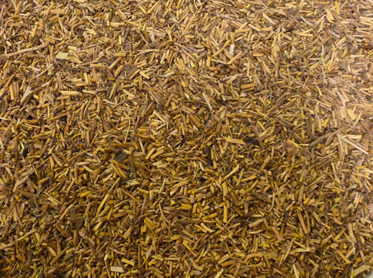 close up or dried and cut Organic Couch Grass rhizome, an herbal remedy from Botanical Remedies herbal dispensary, loose herbal tea