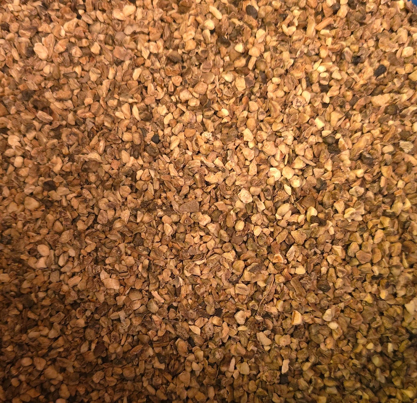 Close-up of dried and cut Organic Devils claw root, an herbal remedy from Botanical Remedies herbal dispensary, loose herbal tea