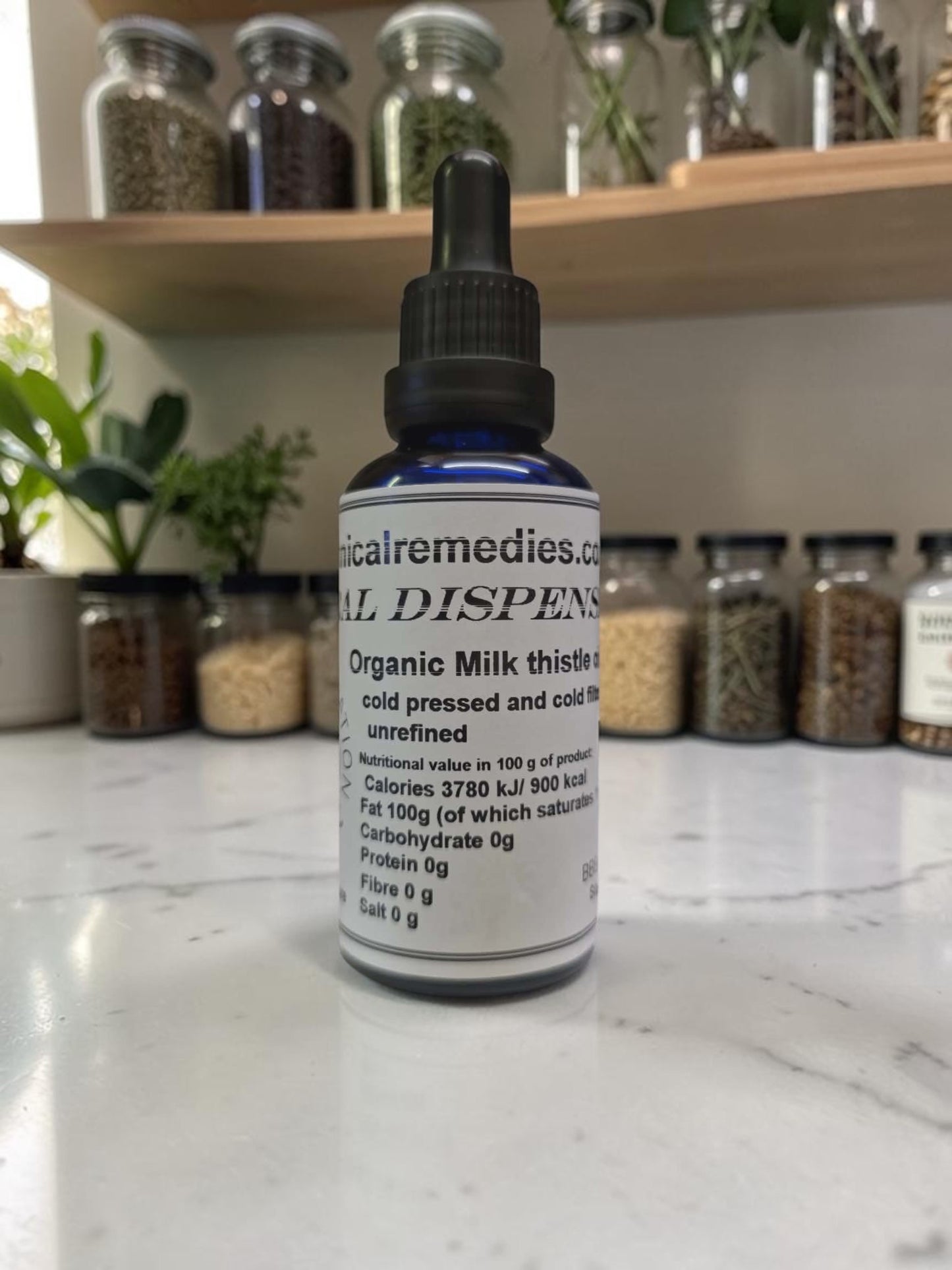 Organic cold-pressed milk thistle seed oil dropper bottle for liver detox and skincare