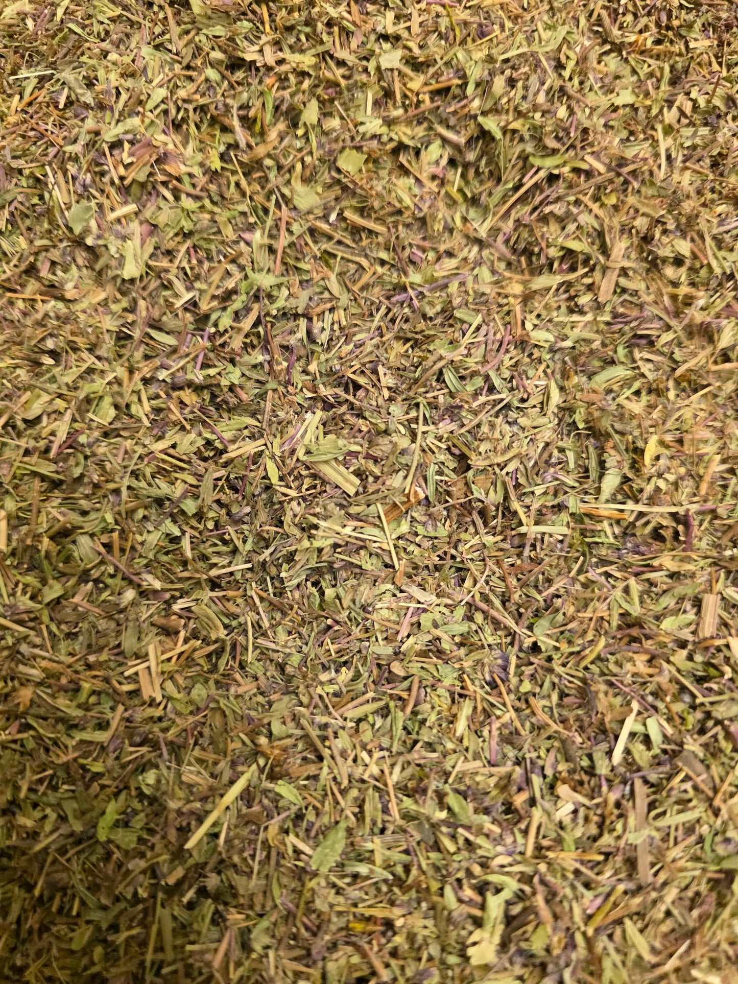 Close-up of dried and cut Organic Wild Thyme herb, an premium herbal remedy from Botanical Remedies herbal dispensary, loose herbal tea