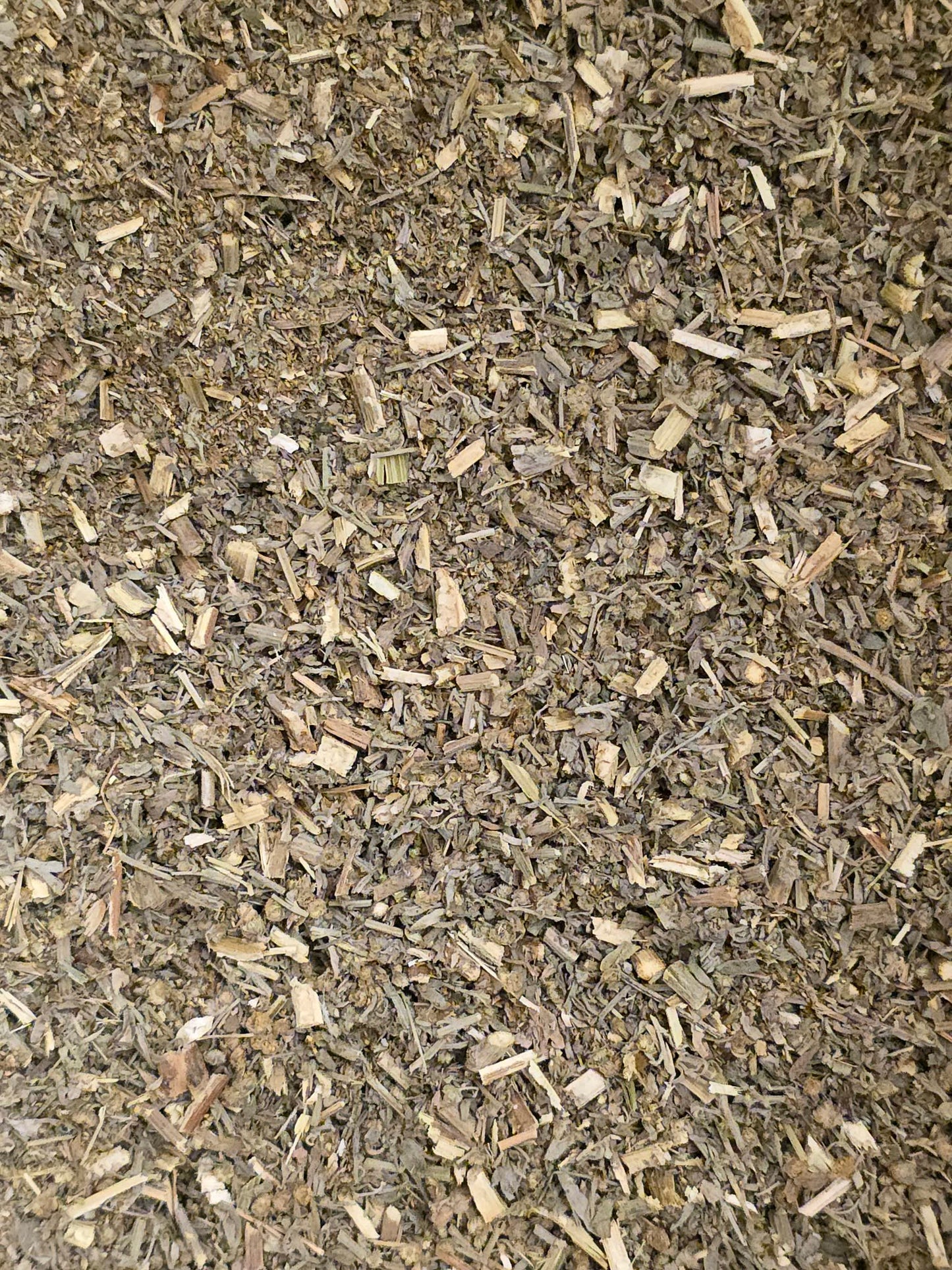 Close up of dried and cut Organic Wormwood herb, an herbal remedy from Botanical Remedies herbal dispensary, loose herbal tea