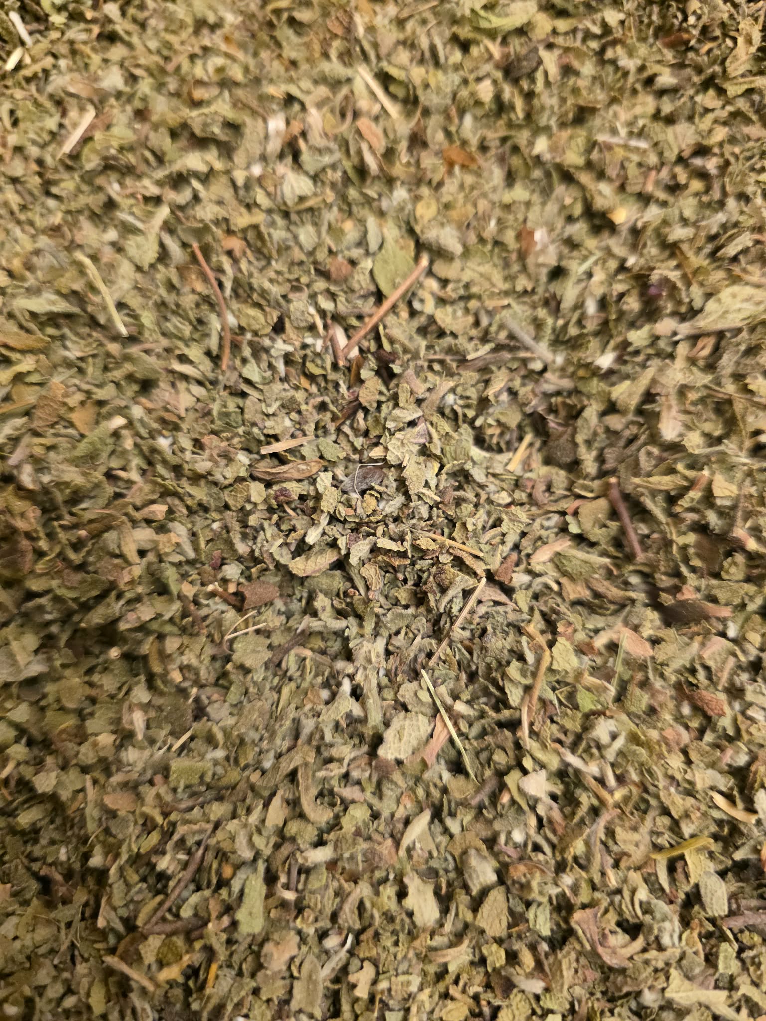 Close-up of dried and cut Organic Rock Rose herb, an herbal remedy from Botanical Remedies herbal dispensary, loose herbal tea
