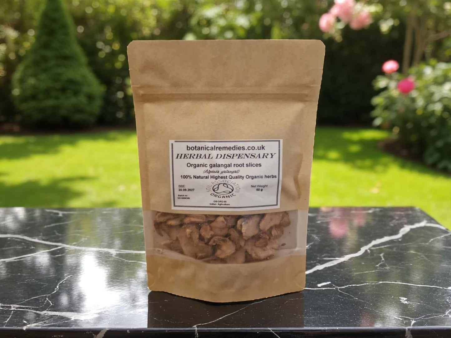 Package with Organic Galangal root slices from Botanical Remedies herbal dispensary, dried and cut, an herbal remedy, loose herbal tea