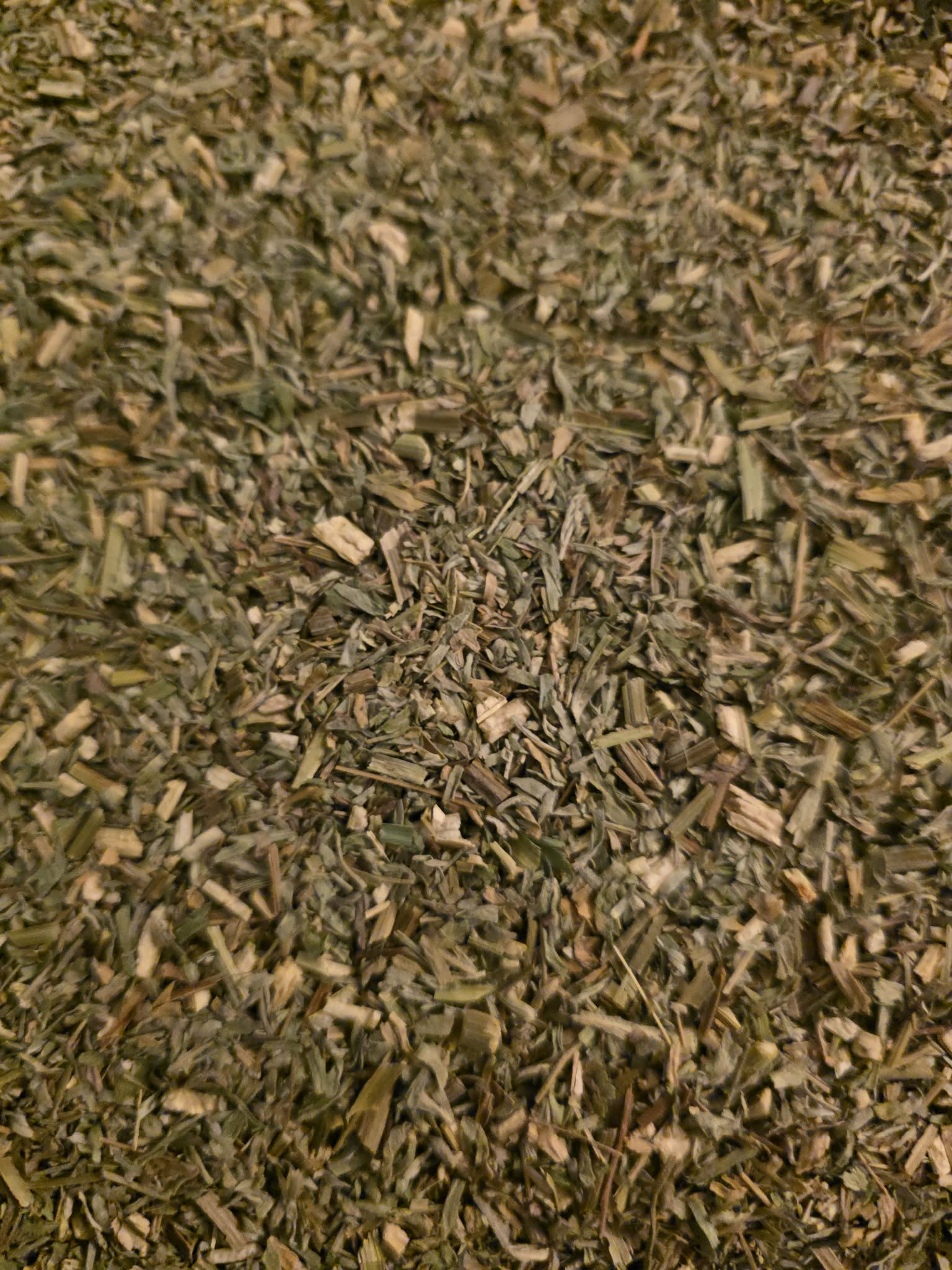 close up of dried and cut premium Wormwood tea, an herbal remedy from botanical remedies herbal dispensary