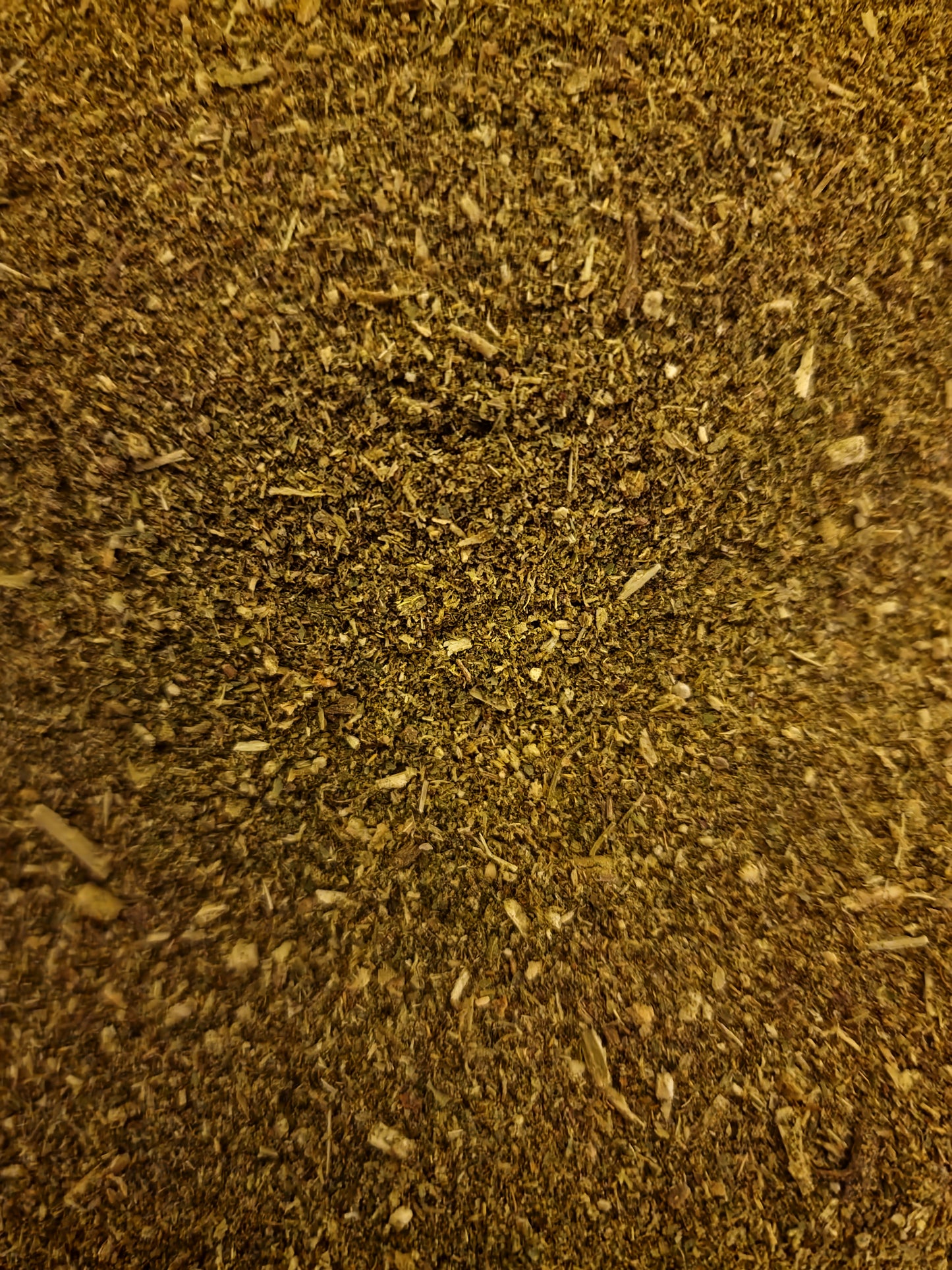 close up of "Sleep well" herbal blend which include Lemon balm leaf, Valerian root, Chamomile flower, Motherwort herb, Hops strobile and Hawthorn flower and leaf, an herbal remedy from Botanical Remedies herbal dispensary