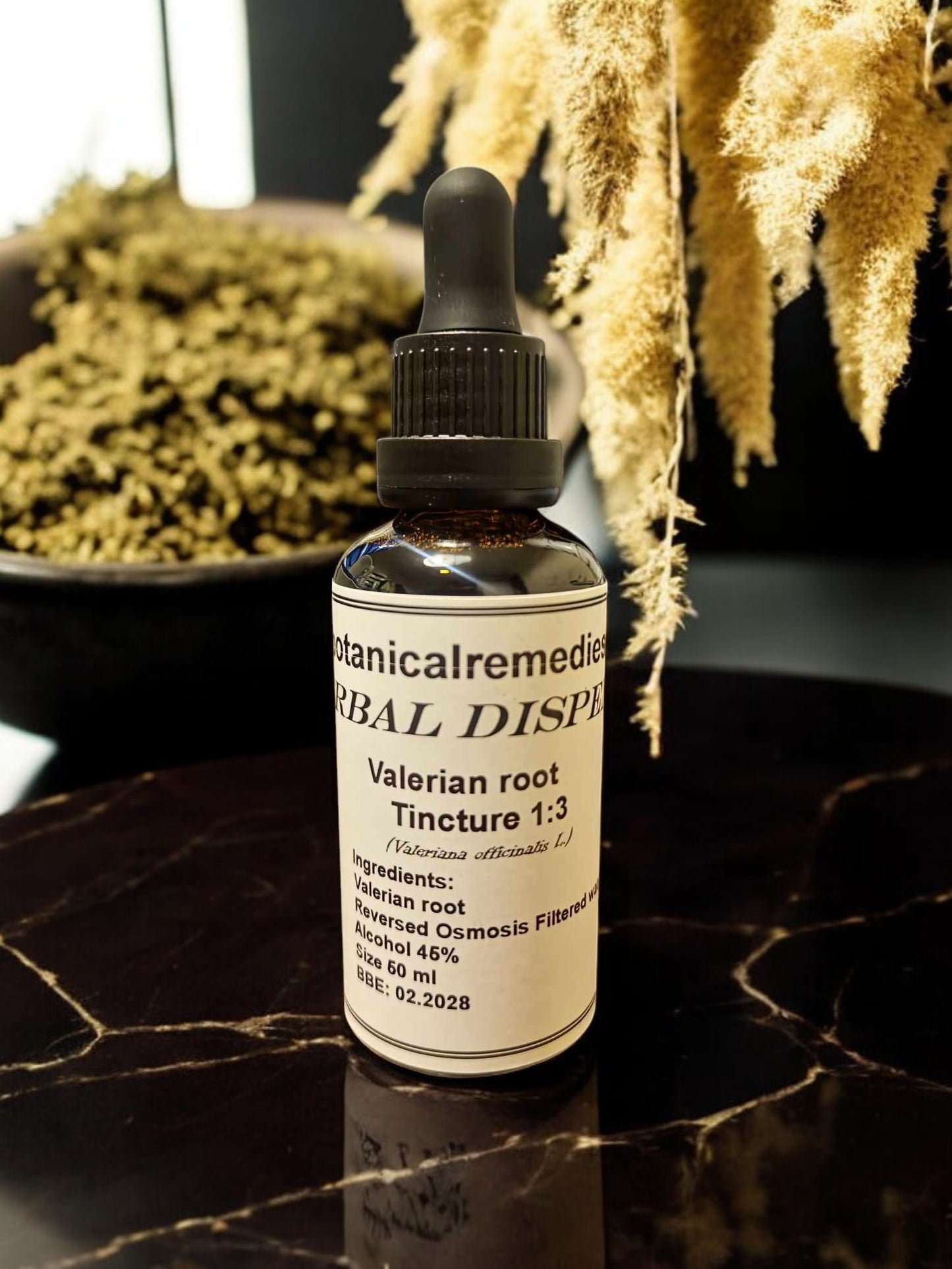 A UV resistant glass bottle with a dropper containing Valerian Tincture, an herbal remedy from Botanical Remedies herbal dispensary