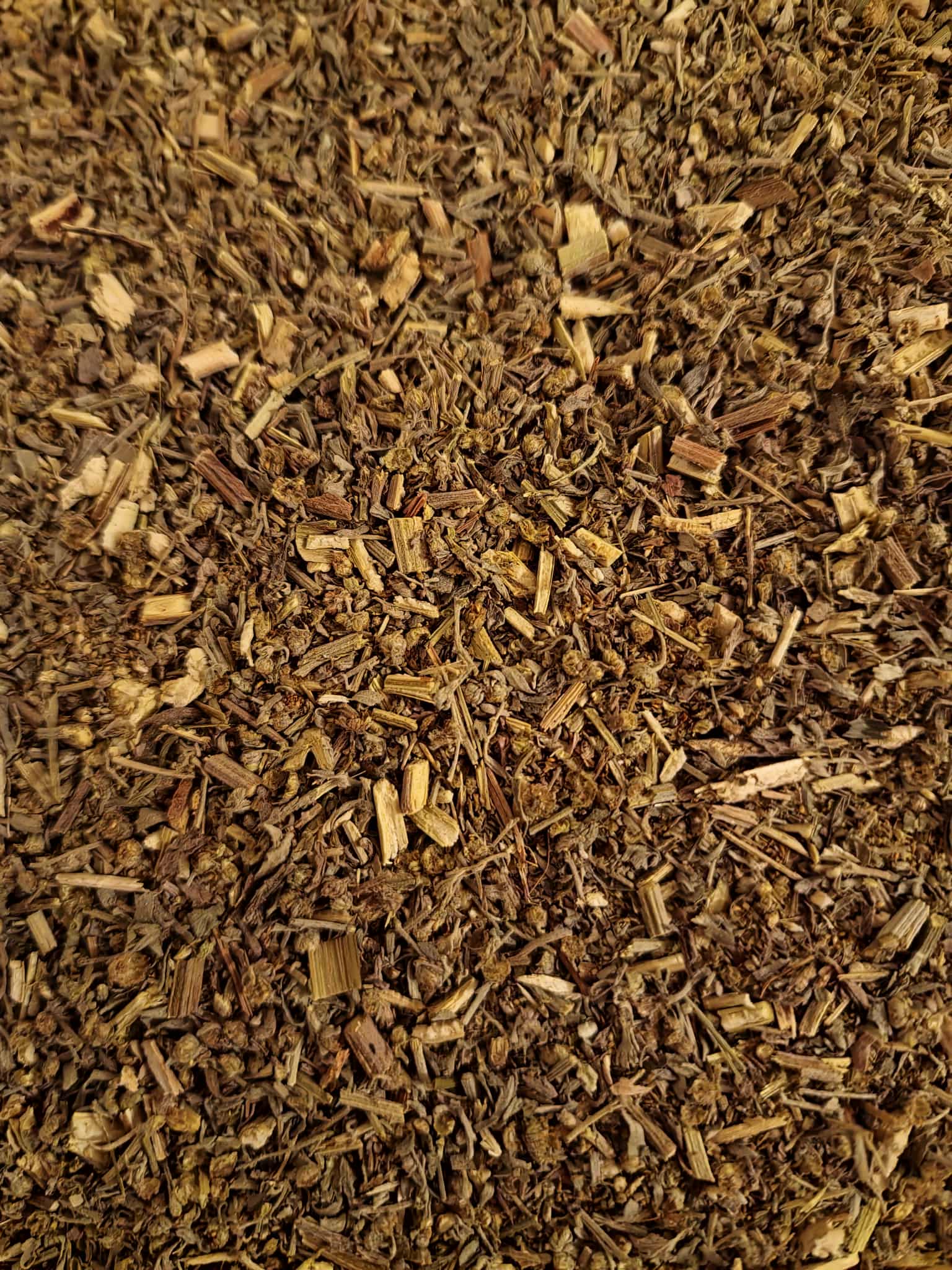 Close-up of dried Wormwood herb tea, loose herbal tea, an herbal remedy from Botanical Remedies herbal dispensary