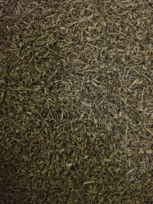 Macro texture close-up shot of premium dried and chopped Organic Wildcrafted Shepherd's Purse (Capsella bursa-pastoris) loose herb.