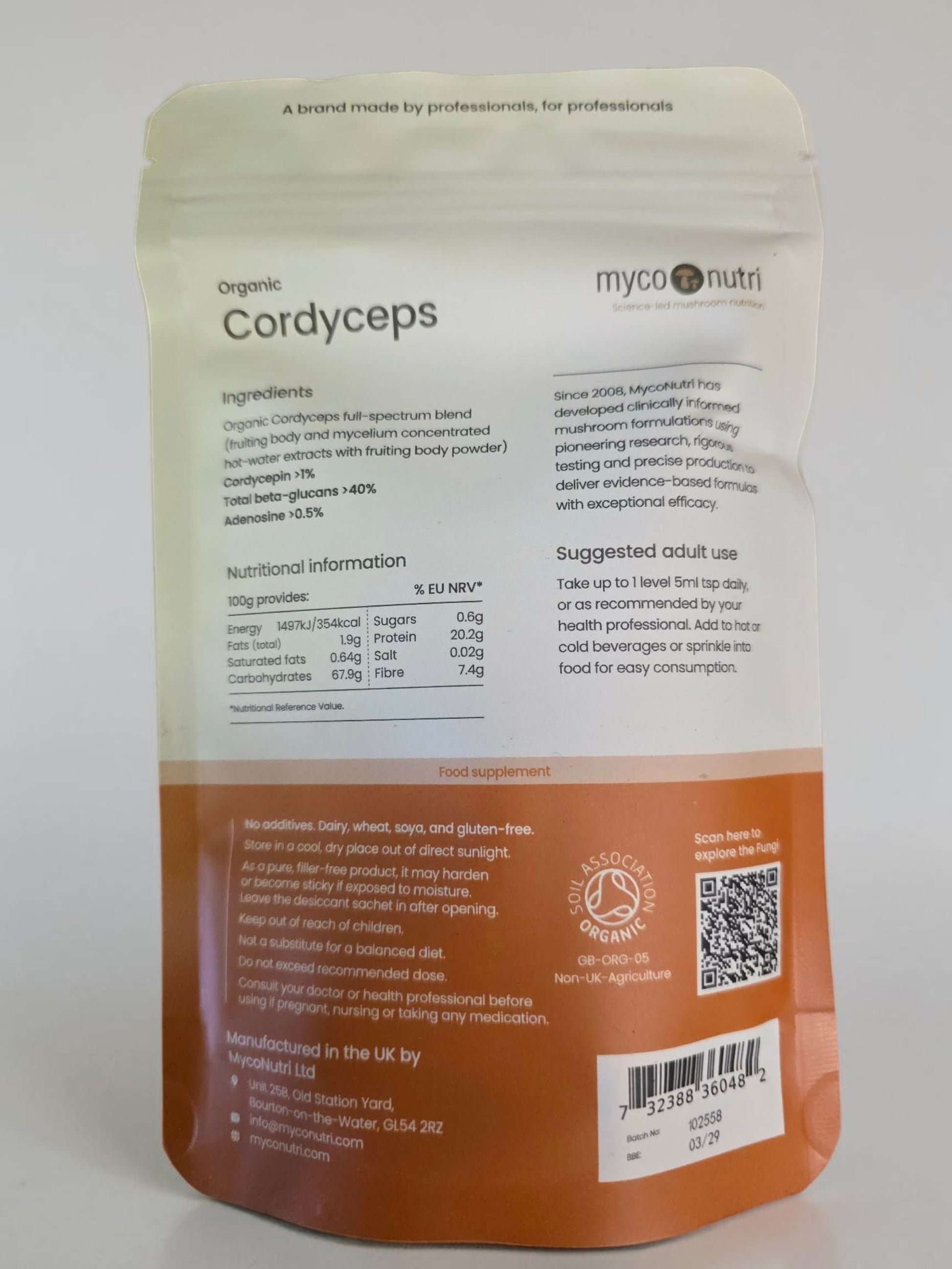 Back label of the MycoNutri Organic Cordyceps 100g powder pouch displaying the full-spectrum blend ingredients and nutritional information. It clearly guarantees clinical yields of >40% total beta-glucans, >1% cordycepin, and >0.5% adenosine, while proudly displaying the Soil Association Organic certification badge