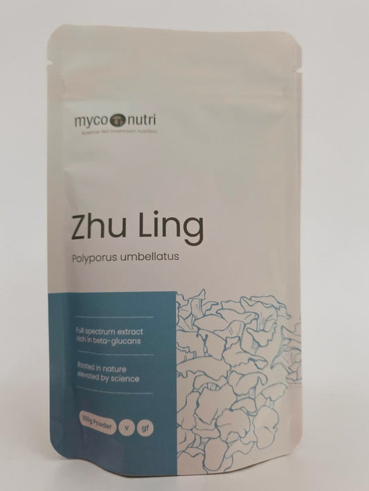 Front view of the clean white and light blue MycoNutri Zhu Ling 100g powder pouch. The minimalist label features a delicate botanical illustration of Polyporus umbellatus and highlights it as a full-spectrum, vegan extract rich in beta-glucans